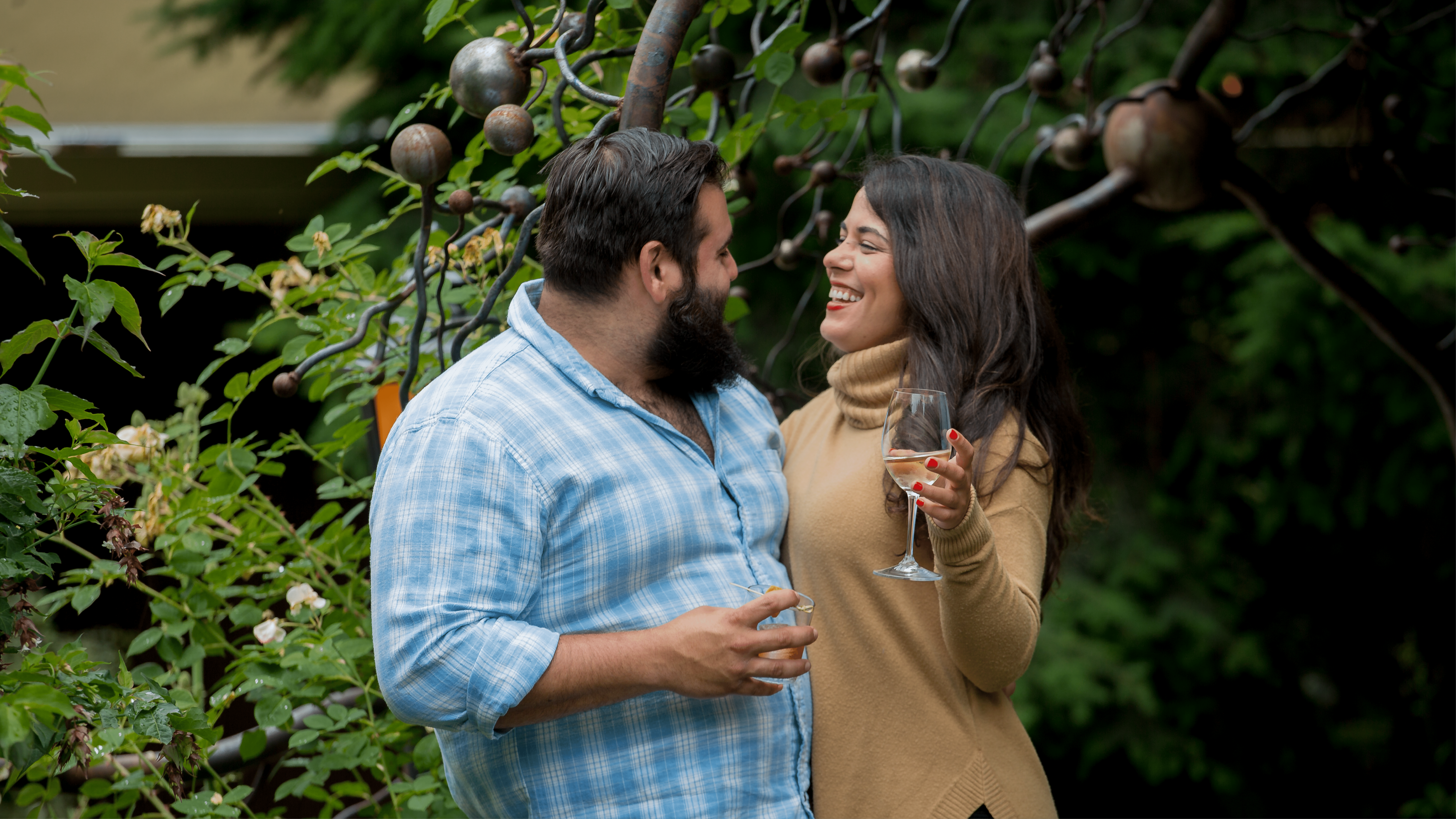 Couple laughing together.