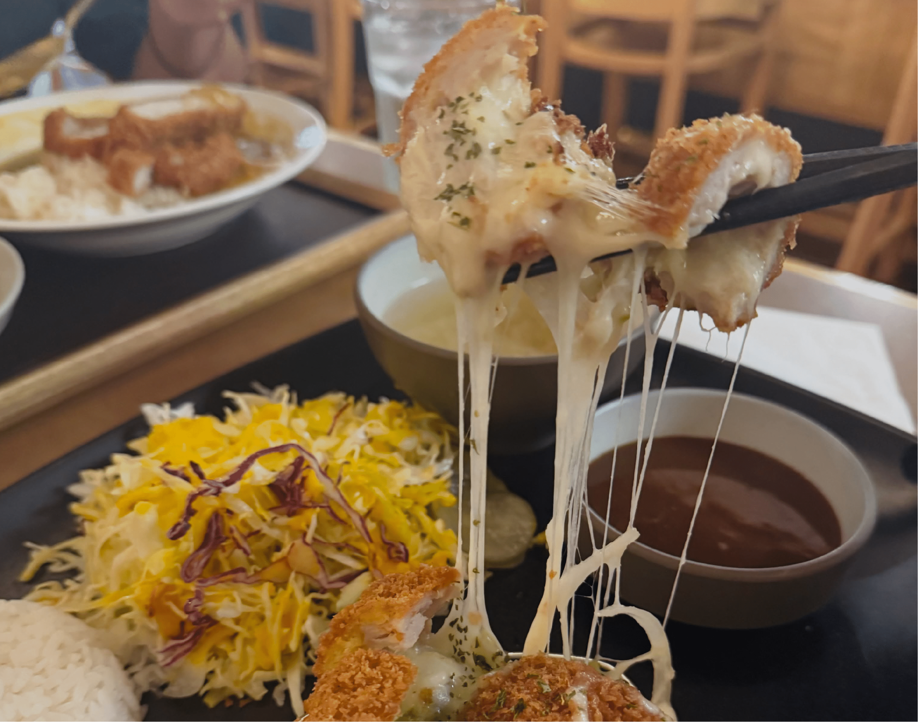 Food being enjoyed at Hana Katsu.
